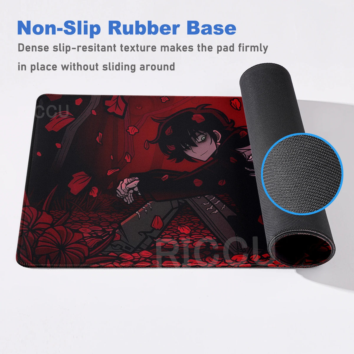 A black mouse pad with a red and black illustration of a character, next to a black non-slip rubber base.