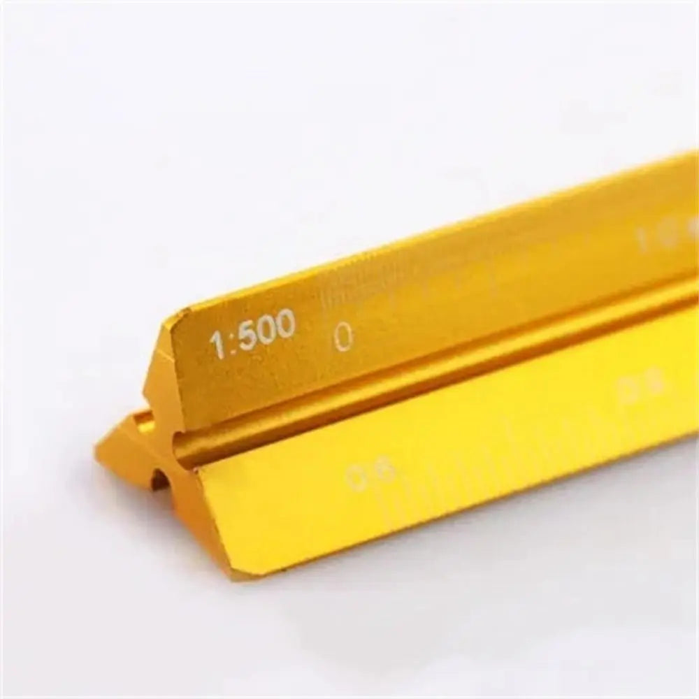 A yellow aluminum triangular scale ruler set with markings showing 1:500 magnification.
