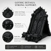 A black gothic skull phone stand featuring intricate arch design and a stable base.
