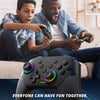 A black programmable controller is shown in use by a man and a boy playing together.