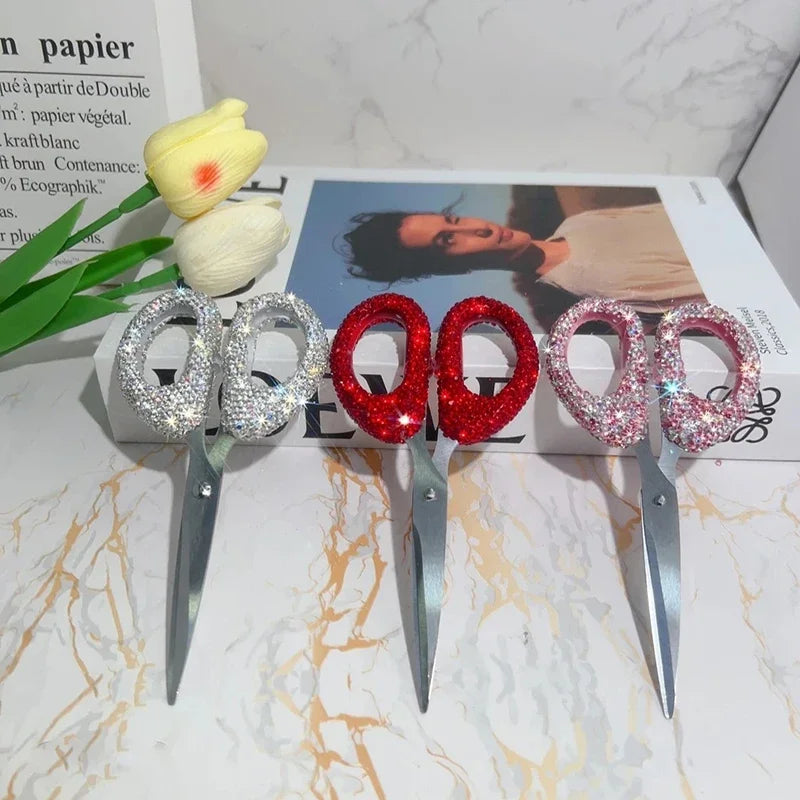 A set of luxury rhinestone crafting scissors with various sizes and colors displayed on a white box.