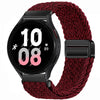 Schwarze Smartwatch mit rotem gestrickten Magnetarmband, die 10:08 anzeigt.