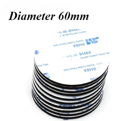 Rolls of 60mm diameter double-coated tissue tape for mounting.