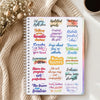 A spiral-bound A5 notebook for daily focus planning featuring motivational phrases and stickers.