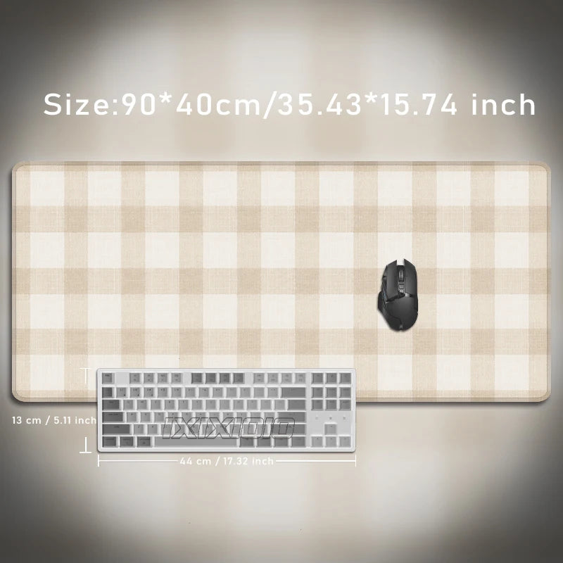 Beige plaid pattern non-slip mouse pad with a black computer mouse and keyboard