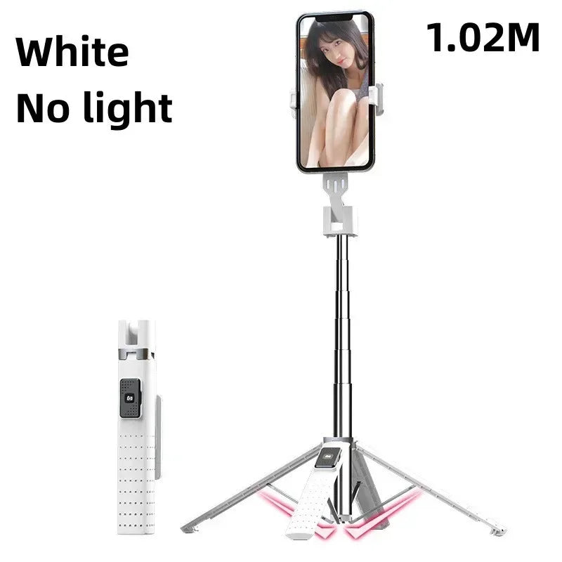 A white Bluetooth selfie stick tripod with a smartphone attached, shown against a white background.