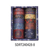 A box containing a set of nine rolled vintage floral washi tapes in various colors and patterns.