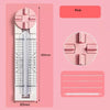 Pink rotary paper cutting machine with a measuring scale and pink cutting wheels