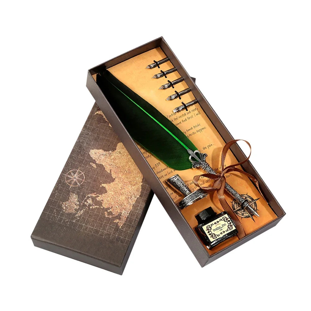A wooden box containing a retro calligraphy feather dip pen set with various pens and a map