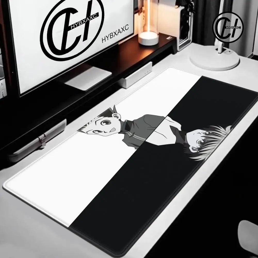 Extra large gaming mouse pad featuring a stylized anime character design on a black and white background.
