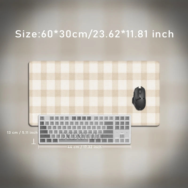 Beige plaid pattern non-slip mouse pad with a laptop and keyboard shown on a light background.