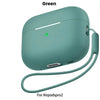 A green liquid silicone case for AirPods Pro 2 with a cleaning pen and lanyard.