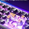 Close-up of a mechanical keyboard showing illuminated purple and pink switches for high performance esports use