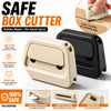 A beige box cutter tool shown with a hidden blade and card slot design, demonstrating its safe use.
