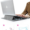 Versteigtes magnetisches Halterung als zweite Computer-Ständer für ein MacBook.