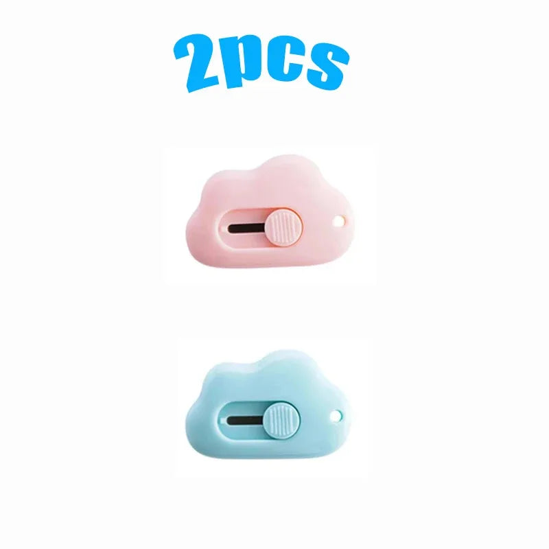 A set of two multi-color rabbit cloud utility knives, one pink and one light blue.