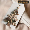 Christmas gift tag featuring wood grain and pinecone cutouts with hemp rope for farmhouse decor