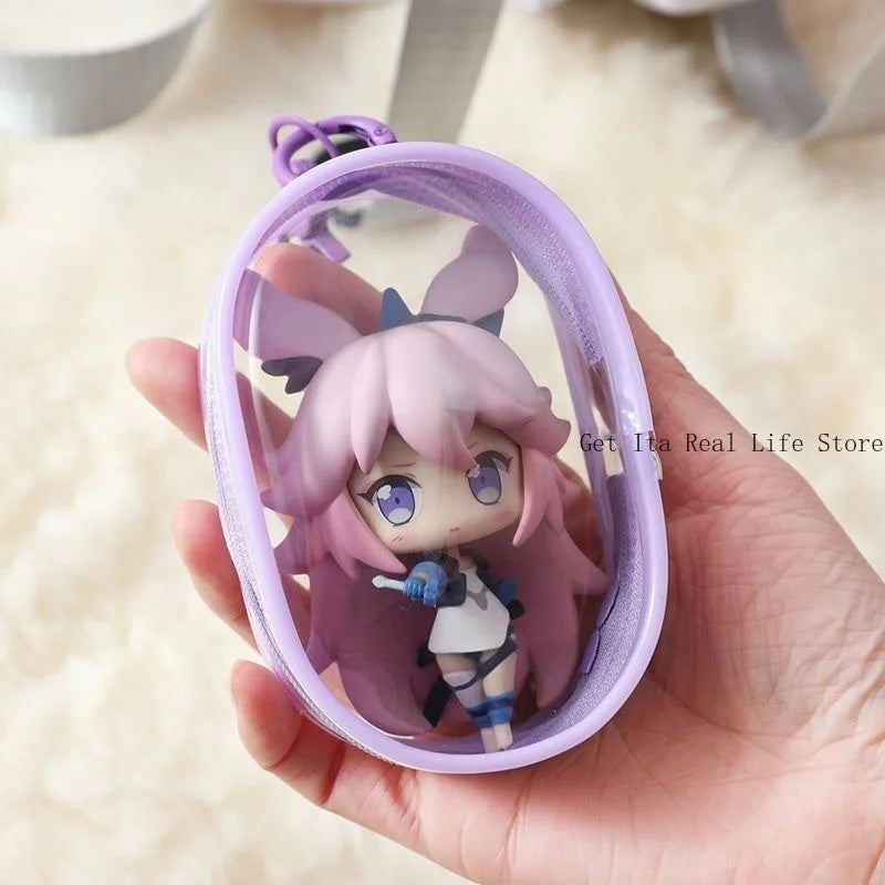 A hand holds a mini clear bag featuring a purple-haired anime character with purple ears and blue eyes.