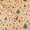 Roll of beige wrapping paper featuring repeating designs of Christmas trees, pine branches, and red ornaments.