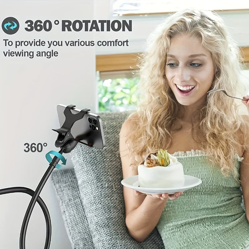 A woman holds a white cake on a plate while a flexible gooseneck phone clamp mount is visible in the background.