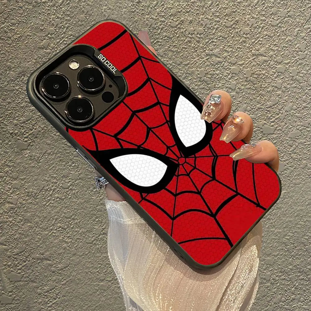 A hand holds a red Spider-Man themed phone case featuring a black and white spider design against a gray wall.