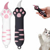 A pink and black cat paw-shaped box cutter with a titanium steel blade being held by a hand.