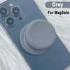 A grey phone case with a silicone magnetic grip cover shown on a light surface.