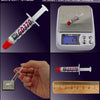 A syringe labeled GD370 is shown next to a digital scale and a wooden ruler.