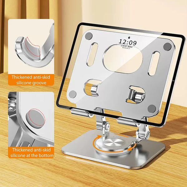 A silver tablet holder stand with a transparent protective cover and silicone grooves for grip.