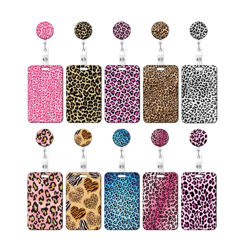 A set of nine leopard print retractable badge holders in various shades and patterns.