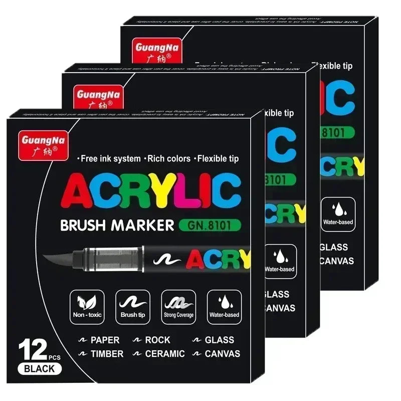 A set of black acrylic brush markers with various tips and colors packaged in a box.