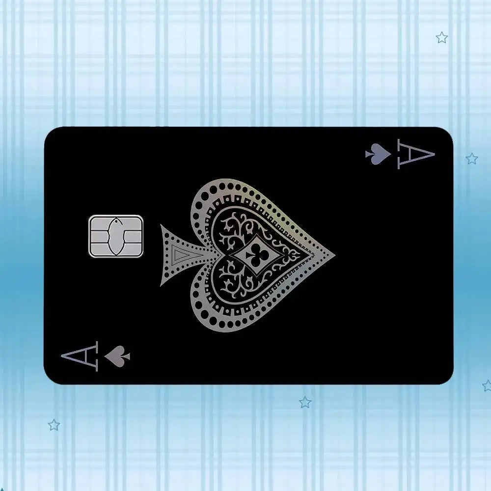 A black card featuring a stylized symbol resembling a diamond or triangle with intricate patterns.