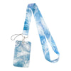 A light blue watercolor feather patterned lanyard with a rectangular tag and a strap.