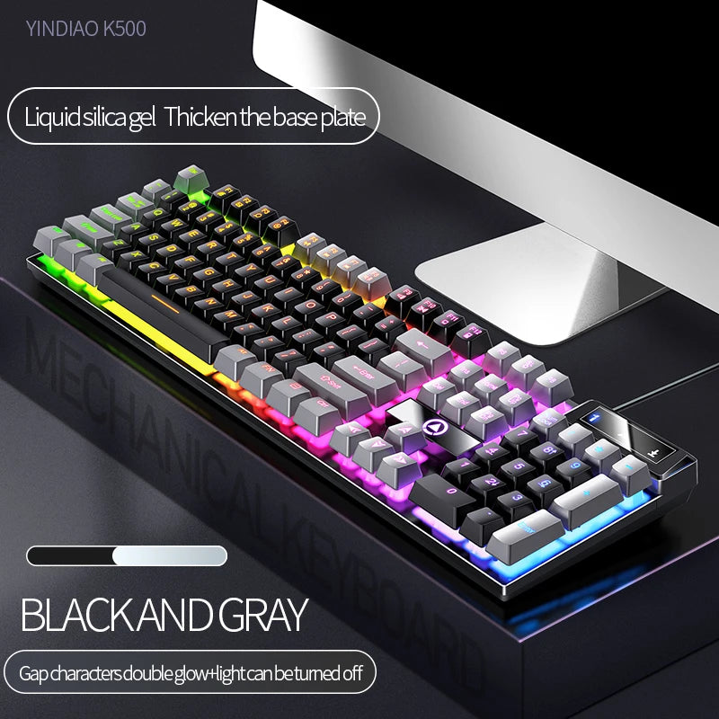 A black and gray mechanical keyboard with double glow features is shown on a desk.