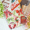 Buntes Dekokarten-Insert mit roter Schleife und dem Wort Kindle