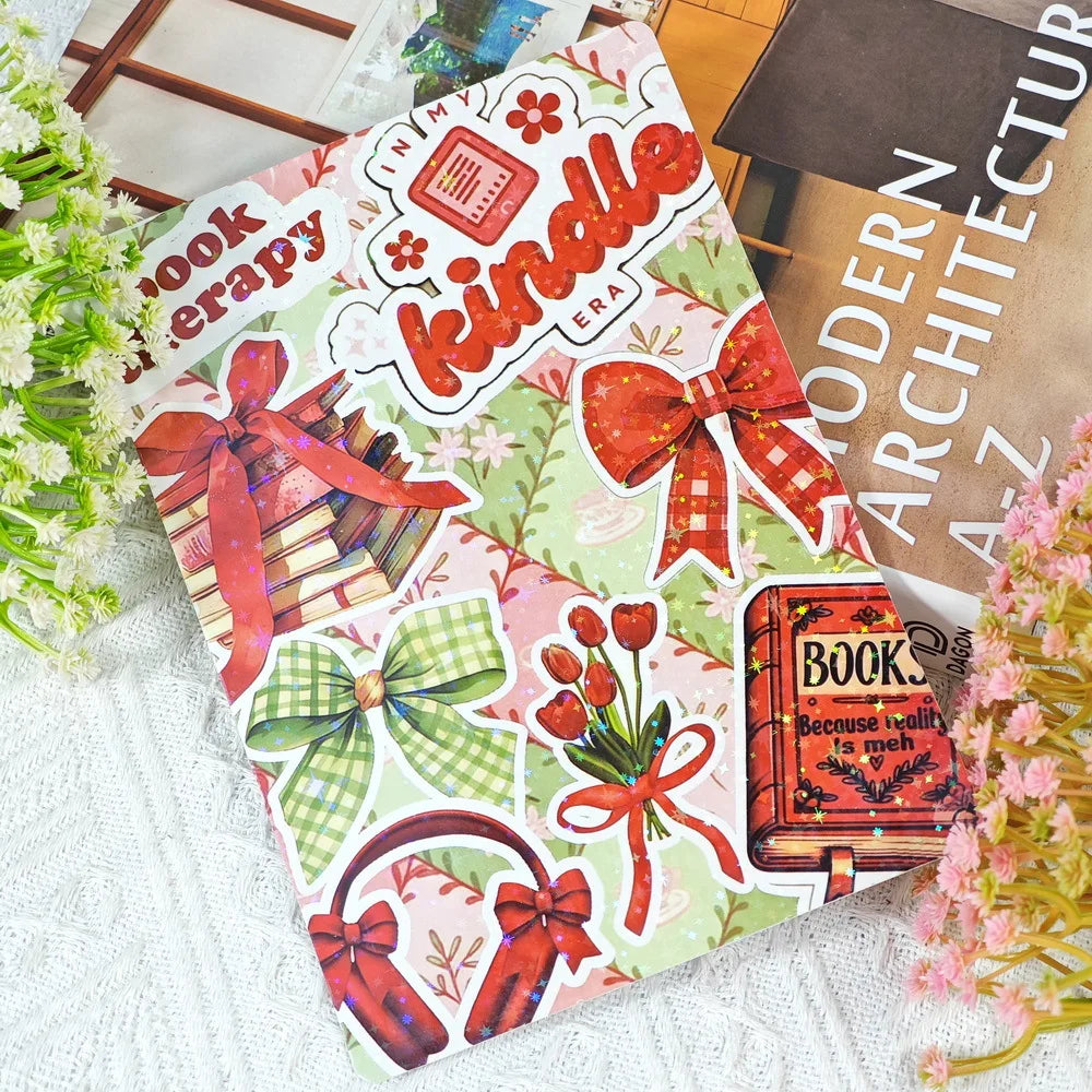 Buntes Dekokarten-Insert mit roter Schleife und dem Wort Kindle