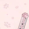 A plastic ruler marked with paw prints is shown against a pink background.