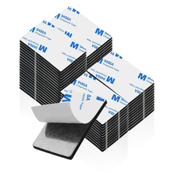 A stack of heavy duty double-sided mounting tape pads in various sizes and colors.