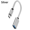 Silver USB-C to USB-A OTG adapter with a flexible cable for data transfer