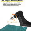 A black 360 degree rotating blade craft cutting tool is shown rotating on a green cutting mat.