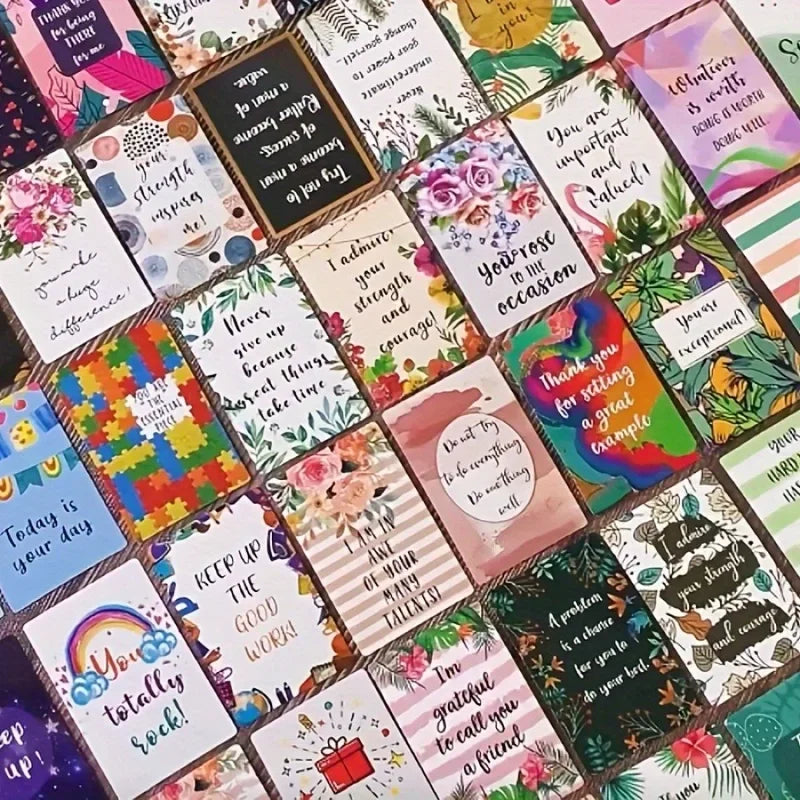 A collection of colorful motivational greeting cards featuring positive messages and floral designs.