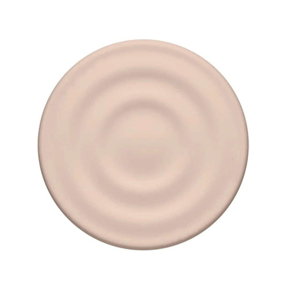 A light pink ripple grip magnetic phone stand with a silicone finish.