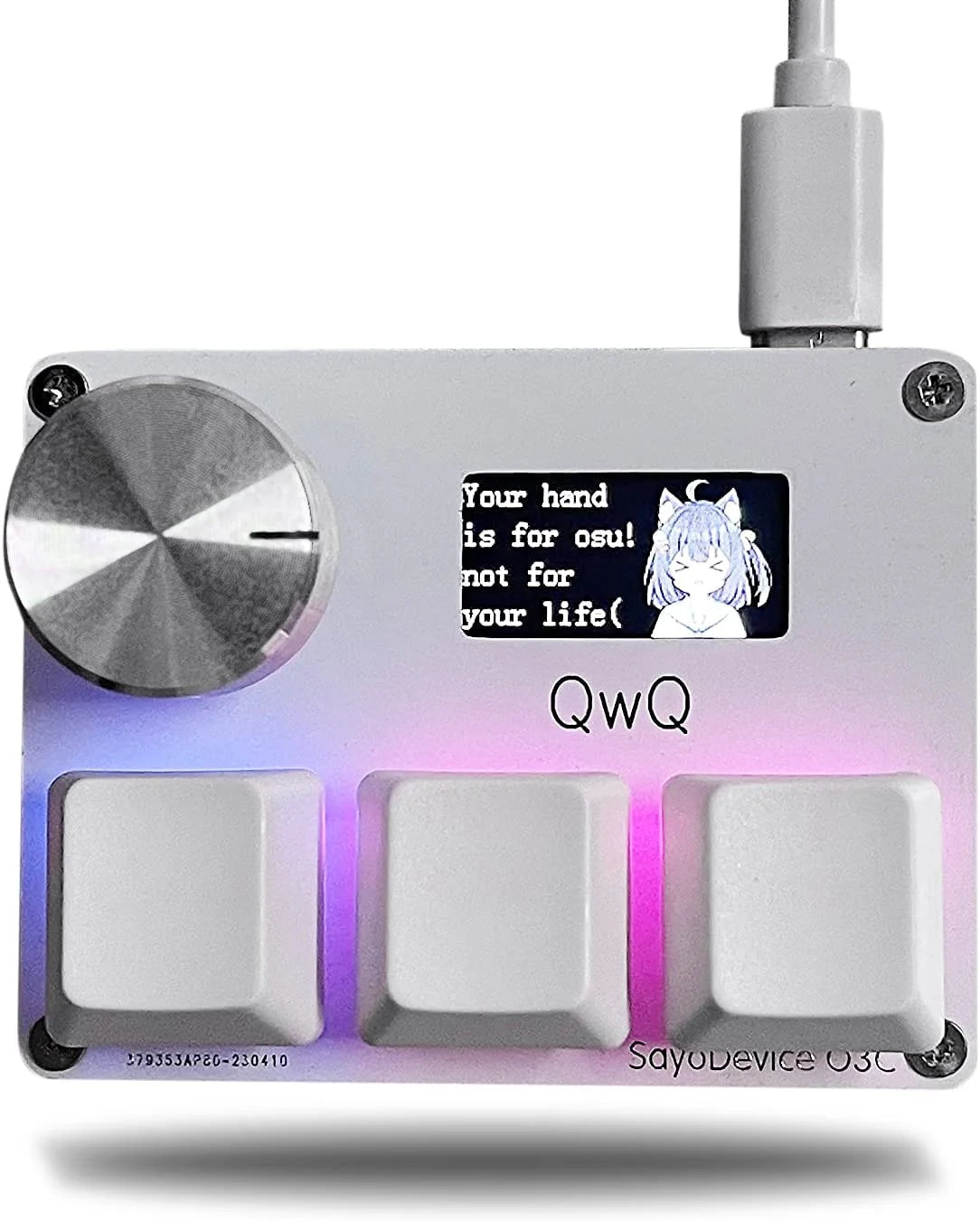 A silver electronic device with three square buttons and a small display labeled QWQ