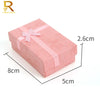 Pink velvet jewelry gift box with a pink ribbon, measuring 5cm by 8cm and 2.6cm high.
