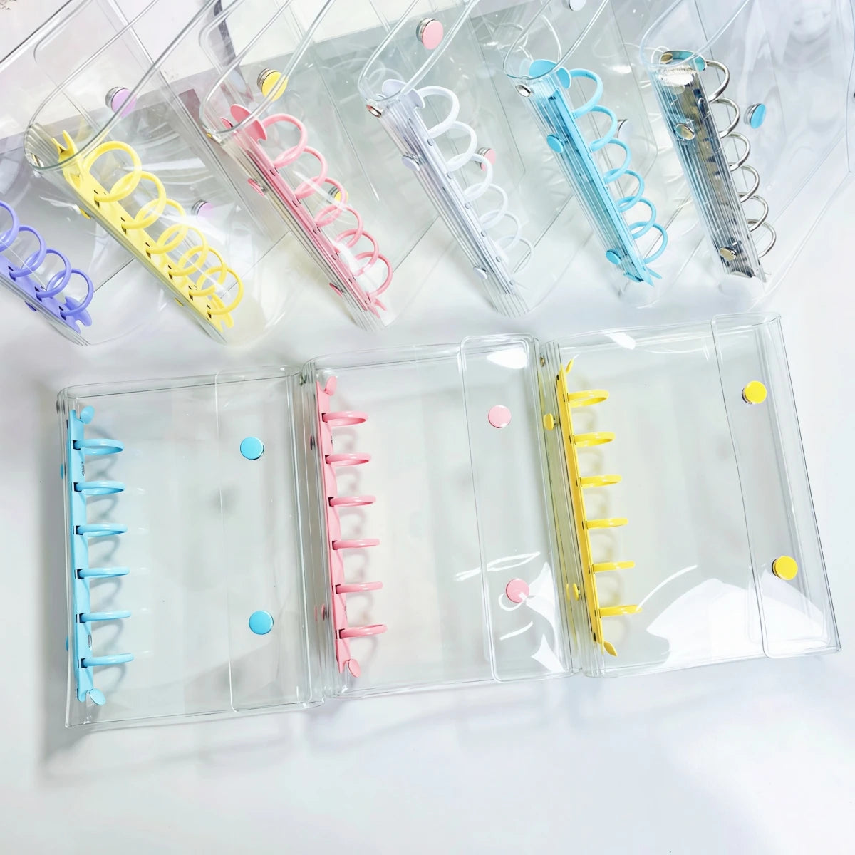 Clear double-button binder with colorful plastic loops for organizing stickers and journaling