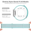 A light blue stretchy nylon watch strap is shown next to a hand, demonstrating its fit and material.