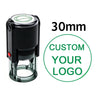 A black self-inking stamp with a clear cylinder, featuring a green logo and the text Luxembourg.
