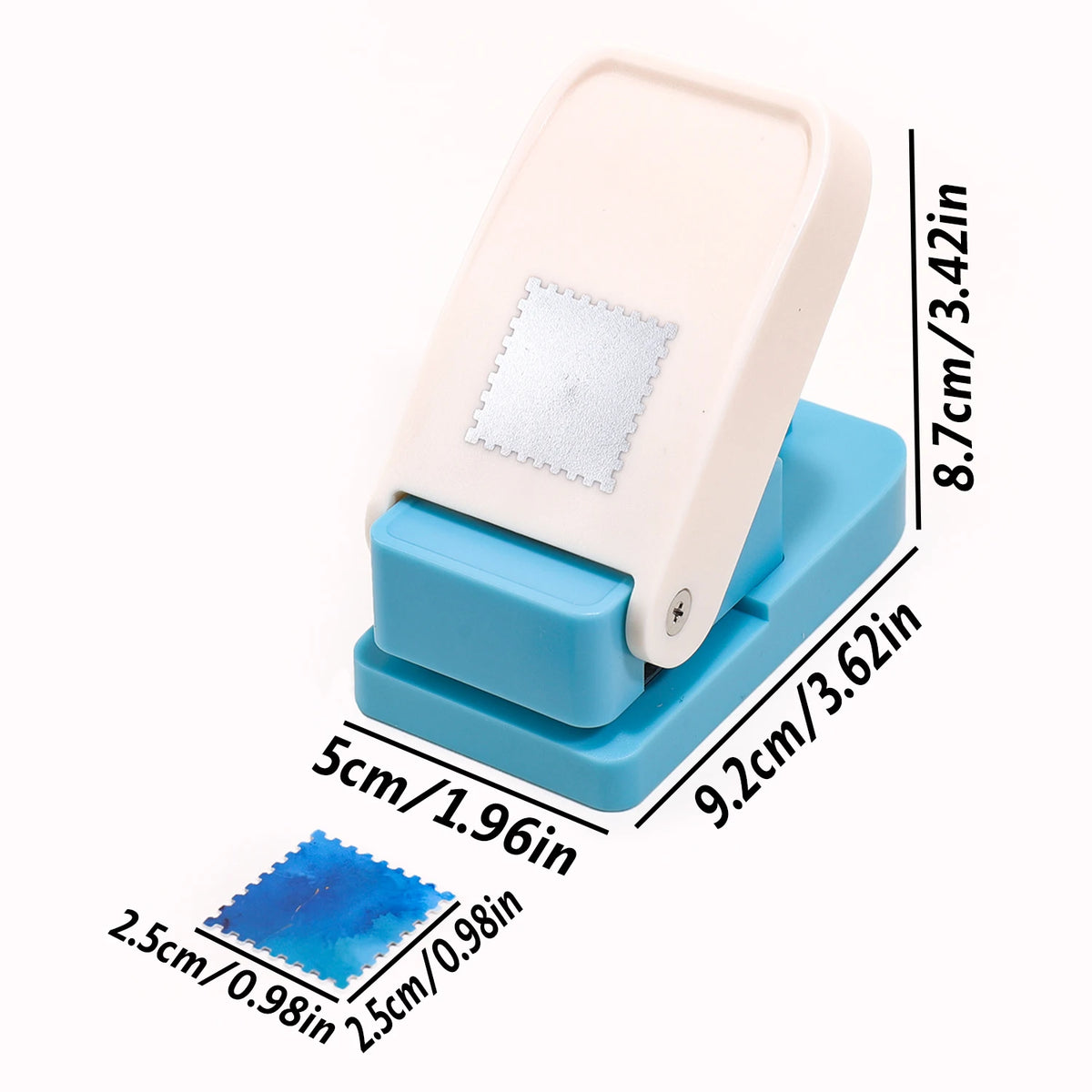 A light pink embossing punch machine with a blue base and a square silver embossing stamp.