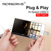 A hand holds a smartphone, demonstrating a Plug & Play Hi-Speed USB 2.0 Mini Type C flash drive connection.