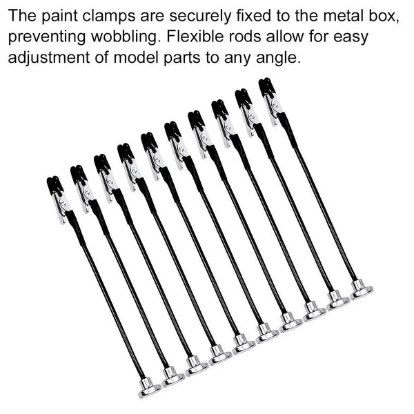 Flexible Stäbe und Klemmzangen zur Befestigung von Modellteilen an einer Metallbox für die Einstellung.